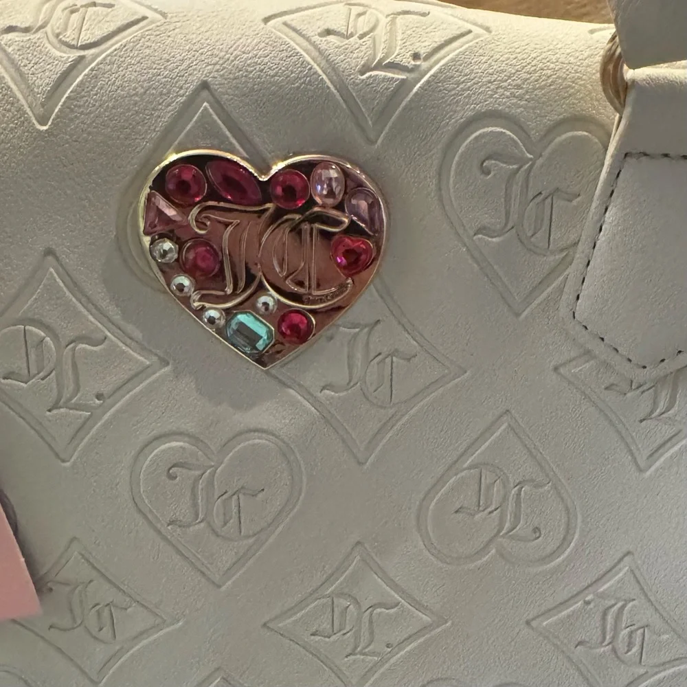 NWT Juicy Couture satchel with embossed pattern and hearts embellishment - Picture 2 of 9